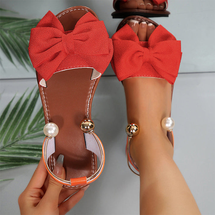 Ena | Elegant sandals with ankle straps and pearls