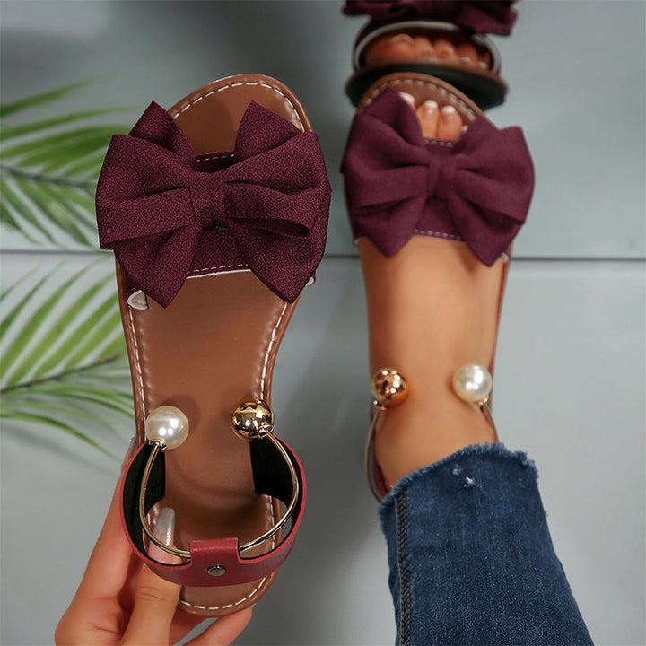 Ena | Elegant sandals with ankle straps and pearls