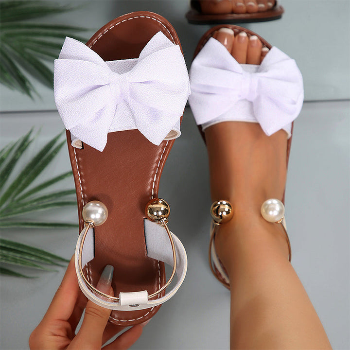 Ena | Elegant sandals with ankle straps and pearls